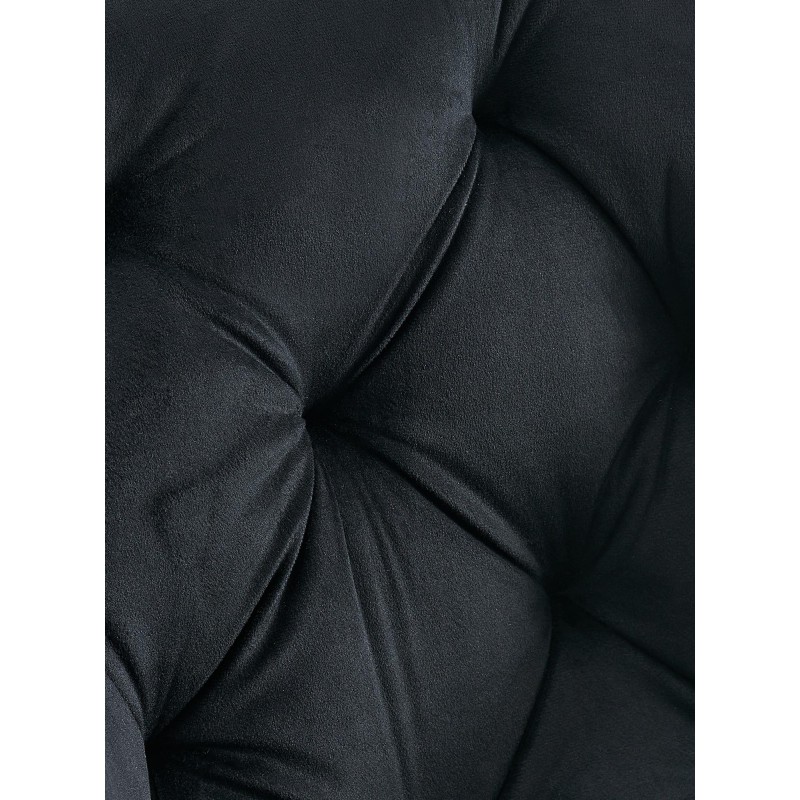 Silla de comedor Antigo de terciopelo negro.