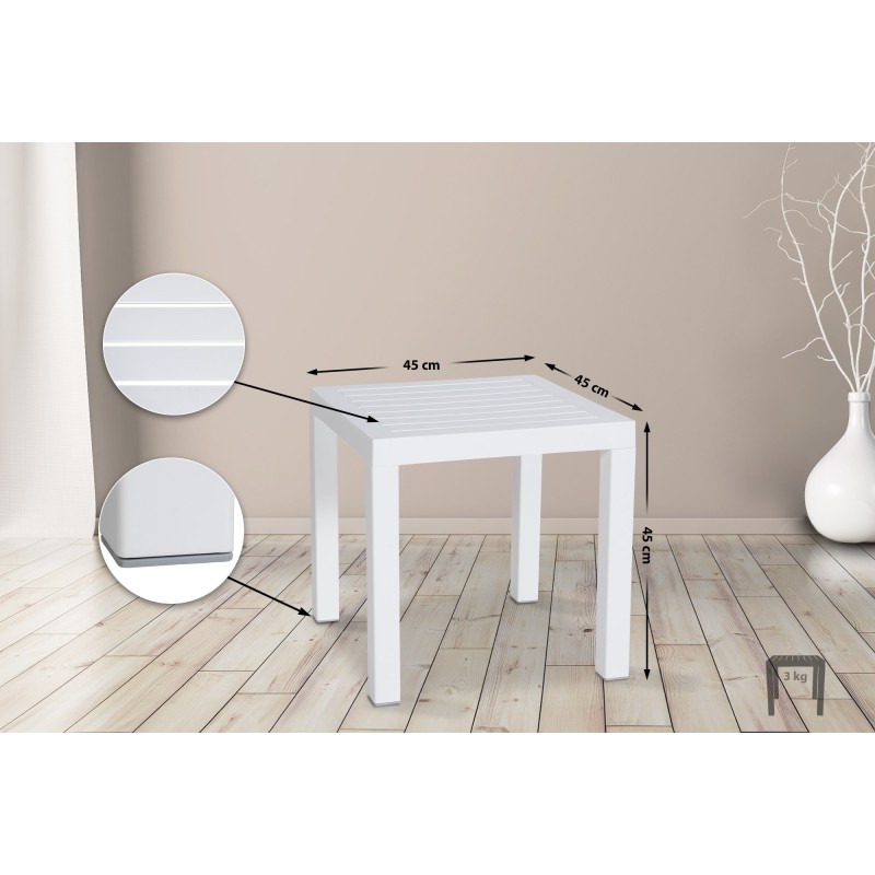 Mesa con vistas al océano blanco