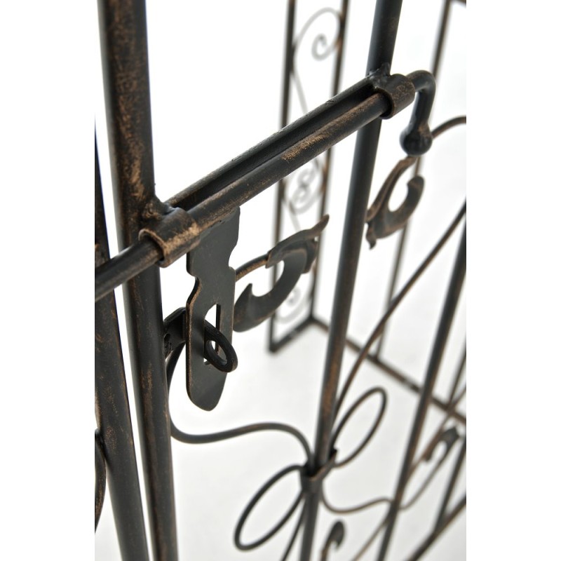 Arco de rosas con portal de bronce de Sina