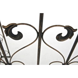 Arco de rosas con portal de bronce de Sina