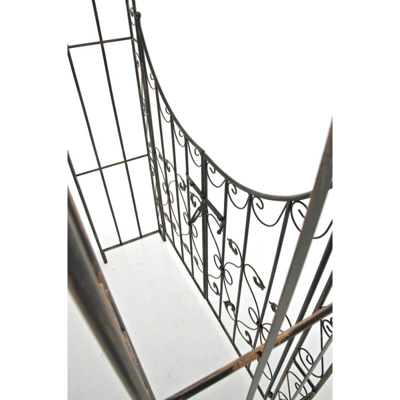 Arco de rosas con portal de bronce de Sina