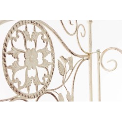 Estante antiguo color crema con motivos florales