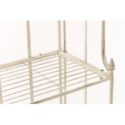 Estante antiguo color crema con motivos florales