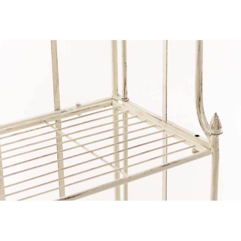 Estante antiguo color crema con motivos florales