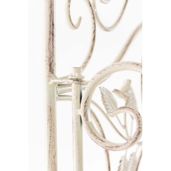 Estante antiguo color crema con motivos florales