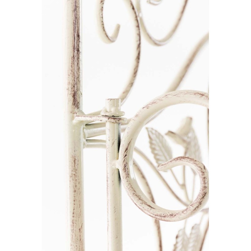 Estante antiguo color crema con motivos florales