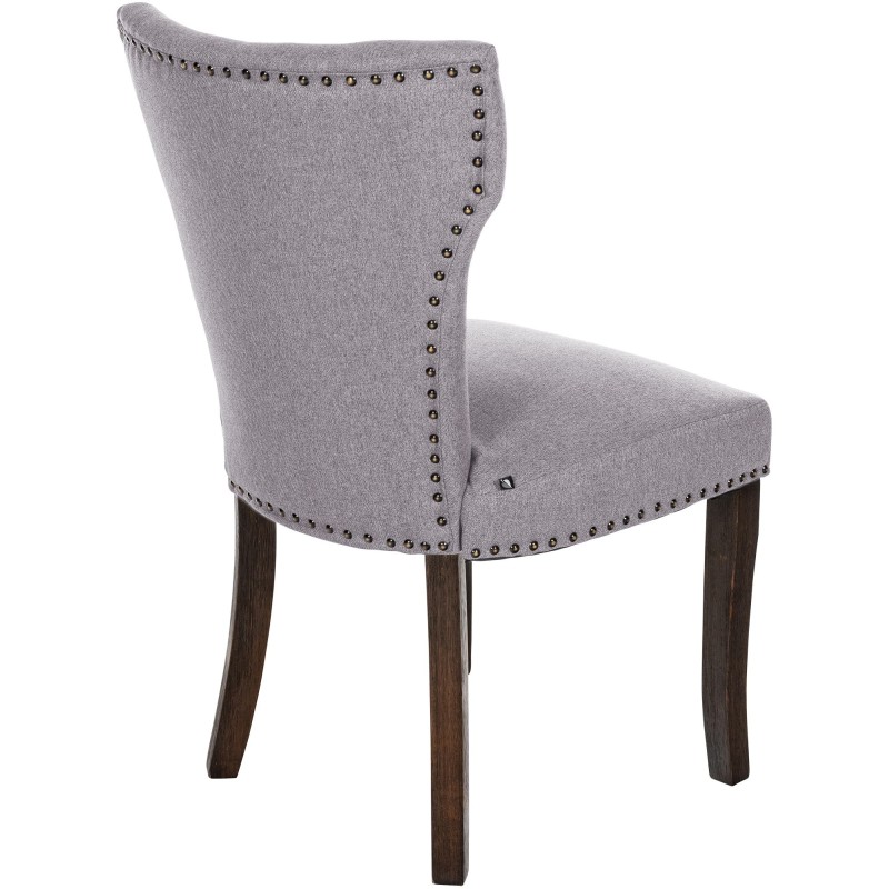 Silla de comedor Zadar, tapizada en tela gris oscuro antigua.