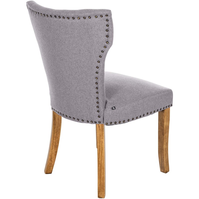 Silla de comedor Zadar, tapizada en tela gris claro antigua.