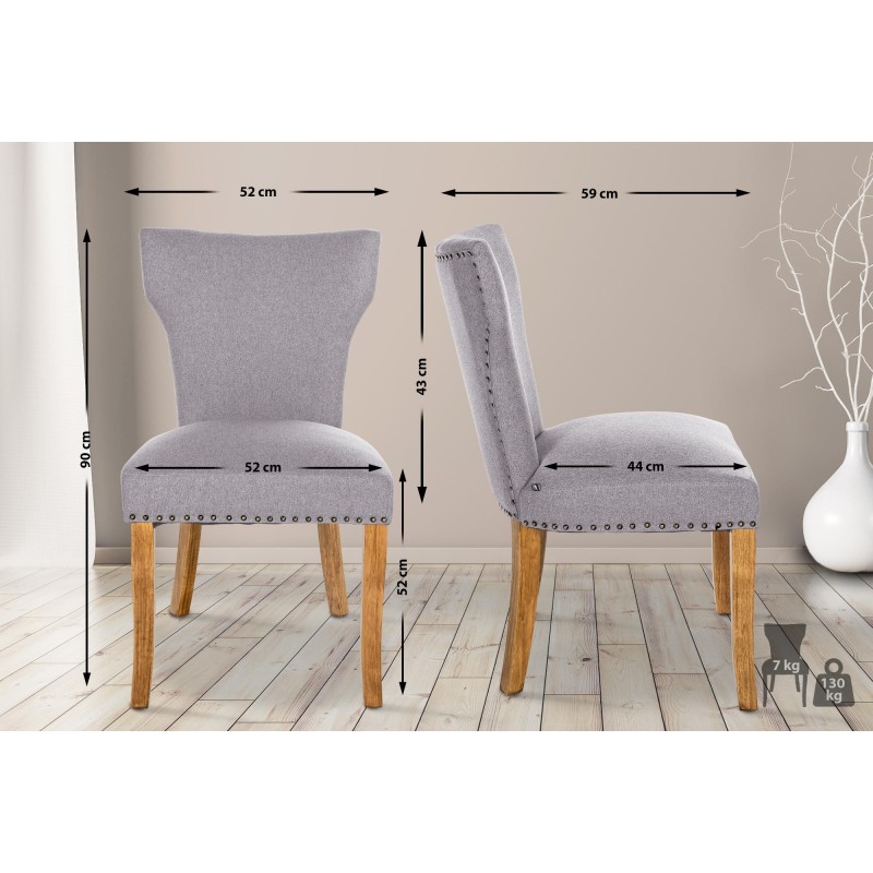 Silla de comedor Zadar, tapizada en tela gris claro antigua.