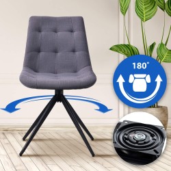 Silla de comedor Merna, tapizada en tela gris oscuro.