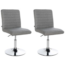 Juego de 2 sillas de comedor Elvas, tapizadas en tela gris.