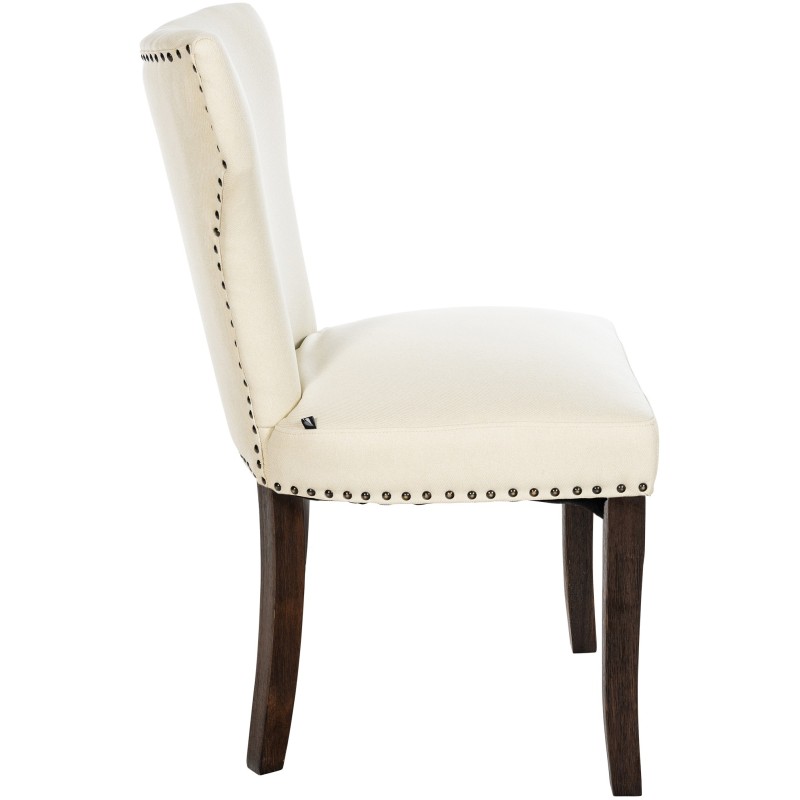 Juego de 2 sillas de comedor Zadar, tapizadas en tela color crema oscuro antiguo.