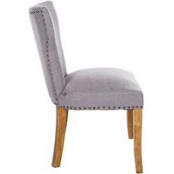 Juego de 2 sillas de comedor Zadar, tapizadas en tela gris claro antigua.