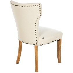 Juego de 2 sillas de comedor Zadar, tapizadas en tela color crema claro de estilo antiguo.