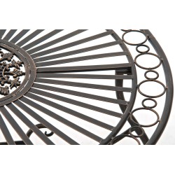 Grupo de sillas de bronce de Indra