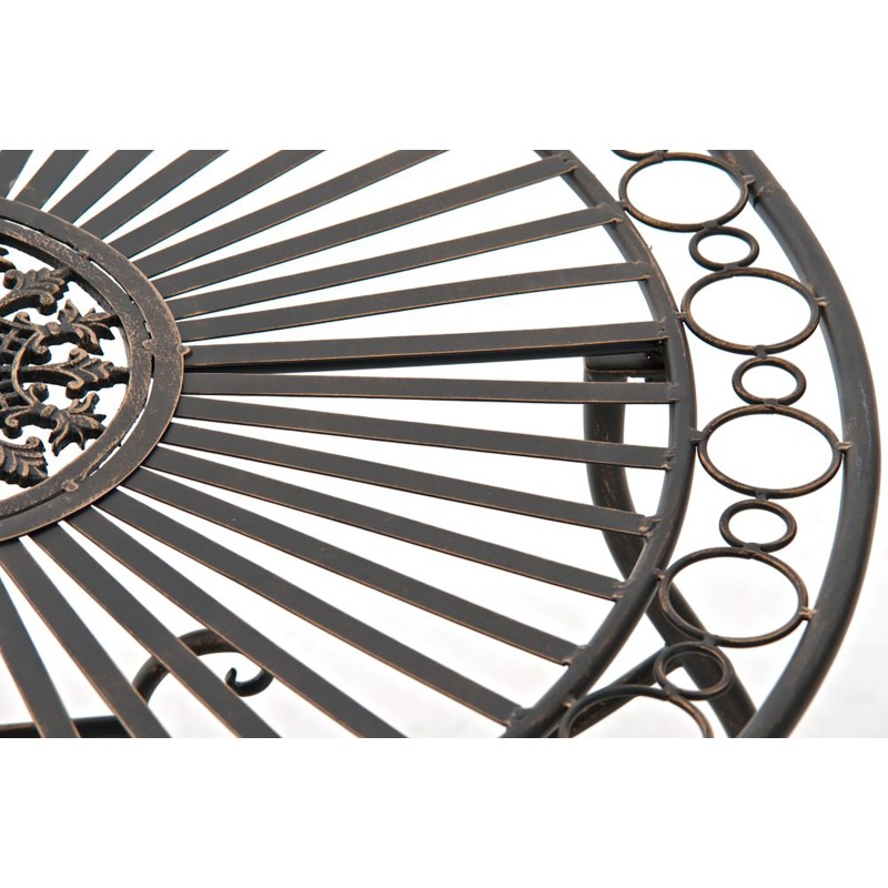 Grupo de sillas de bronce de Indra